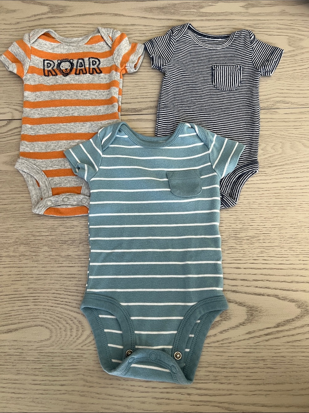 child of mine Striped Pocket One-Piece Trio in Teal, Orange, Navy